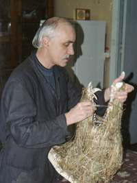 На снимке: доцент В.И.Дробот готовит экспонат для музея